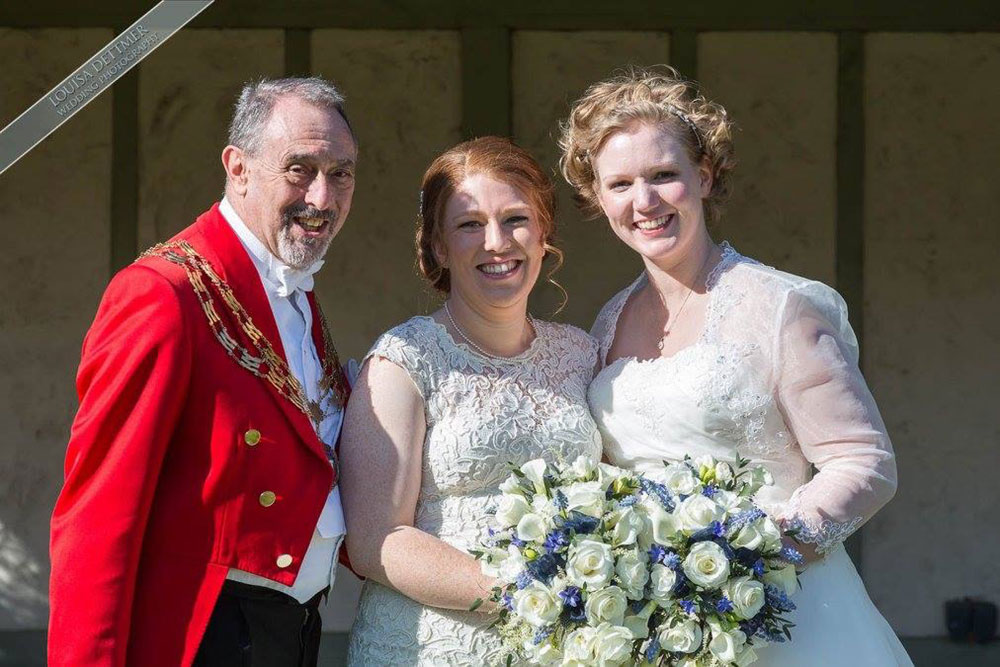Toastmaster with two Brides